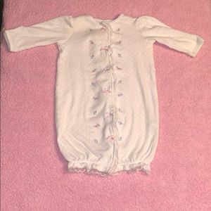 A beautiful gown with lace trim at the bottom